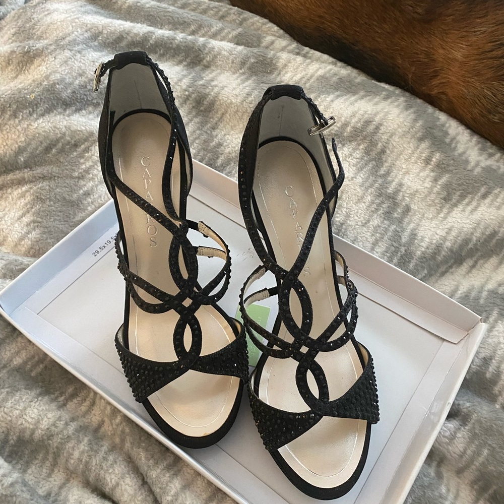 Pair of ladies shoes. Never worn, new in box. Black with black crystals.